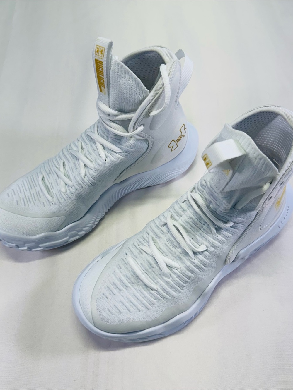 Under Armour White and Gold Performance High-Top Sneakers